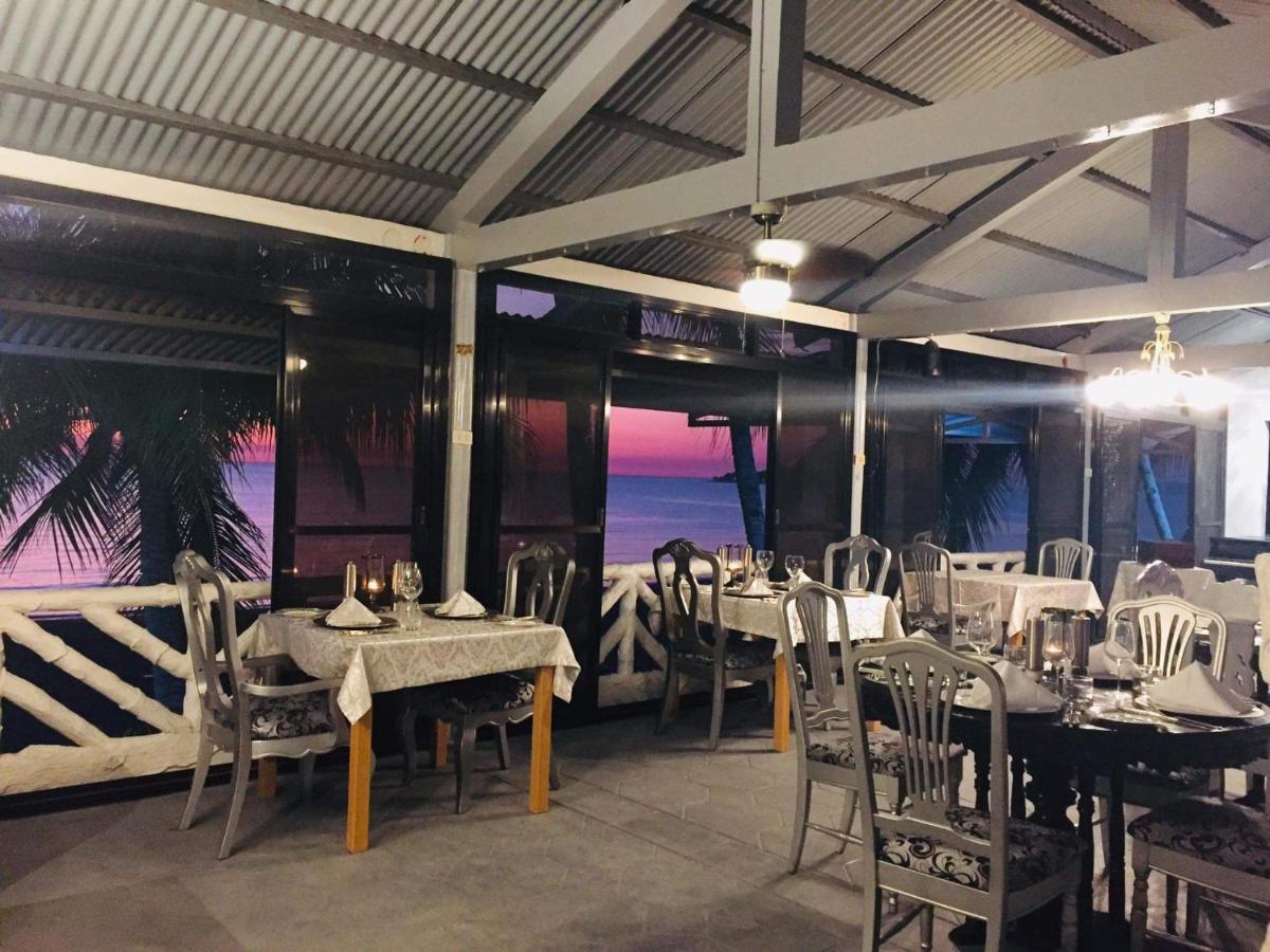 Sunbloom Beachfront Hotel&Restaurant Sinabacan Buitenkant foto