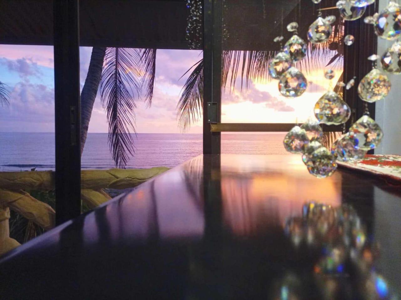 Sunbloom Beachfront Hotel&Restaurant Sinabacan Buitenkant foto